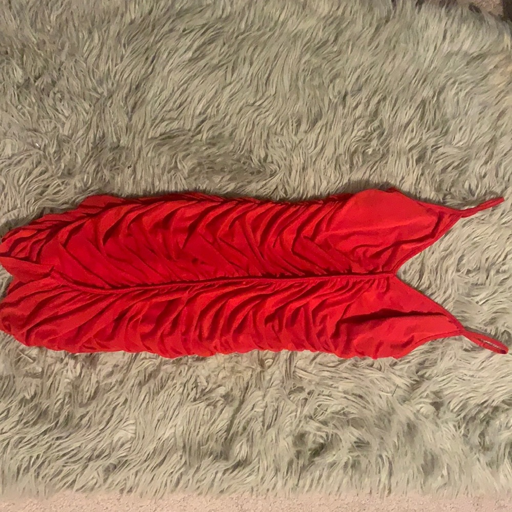 Red ruched body con dress